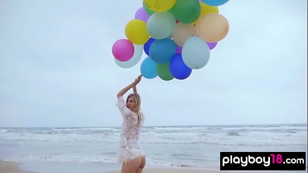 Skinny Italian MILF blondie Farncy Torino plays with balloons on the beach