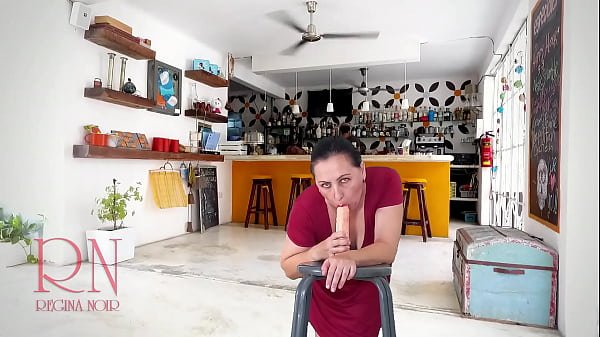 A pretty lady in a red dress sucks and fucks a big dildo. Footjob, titlob, blowjob. 3 1