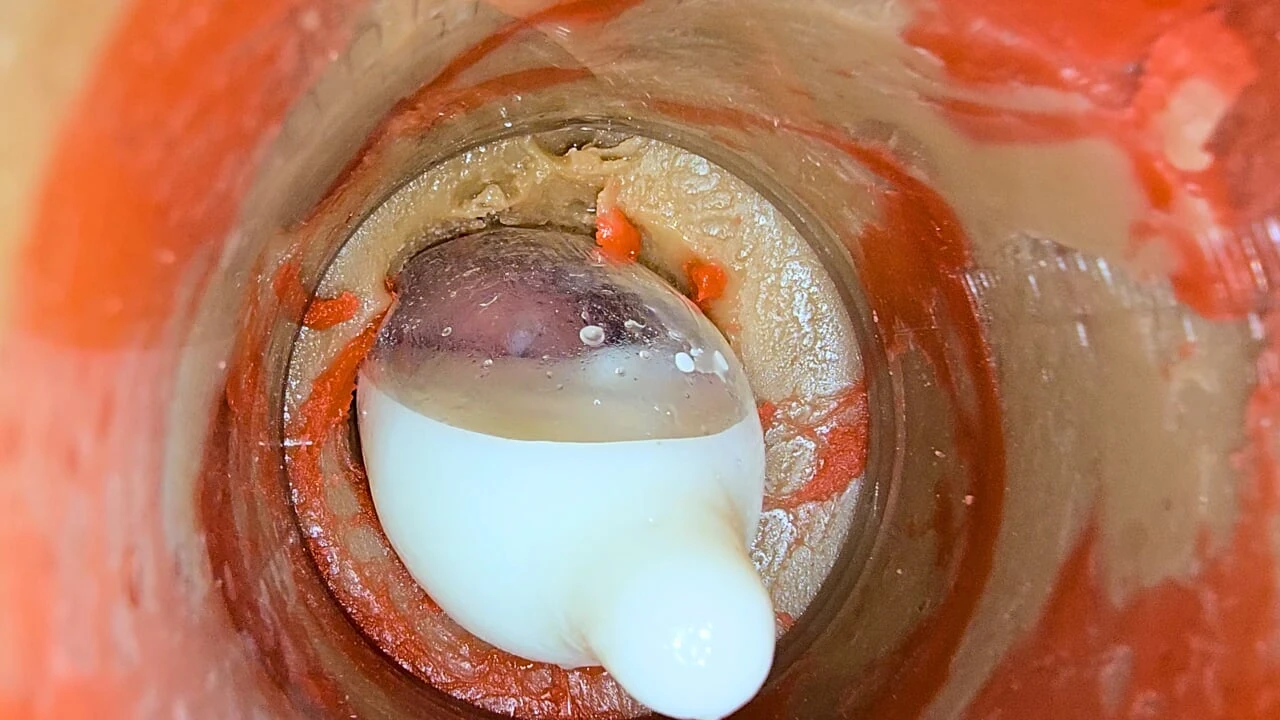 The camera 4k inside the deep pussy records a huge ejaculation with a stuck condom